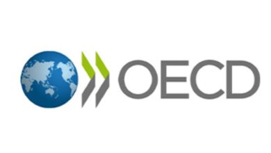 Professional office facilities management staff working inside the OECD headquarters in Paris for the OECD Facility Services Project Assistant Job 2026 international career opportunity.