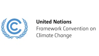 UNFCCC Internship Job 2026: Apply Now for an Exciting United Nations Climate Change Career Opportunity featuring young professionals participating in a global climate policy meeting.