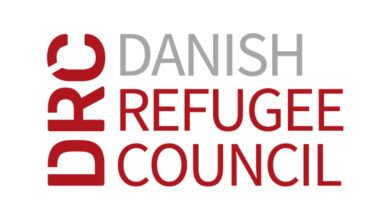 Danish Refugee Council Assistant Job 2026 opportunity showing humanitarian field worker supporting vulnerable communities in Tripoli