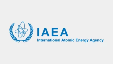 International students working in a professional office environment at the IAEA Headquarters in Vienna during the IAEA Internship Job for 2026 with €1,450 per month stipend